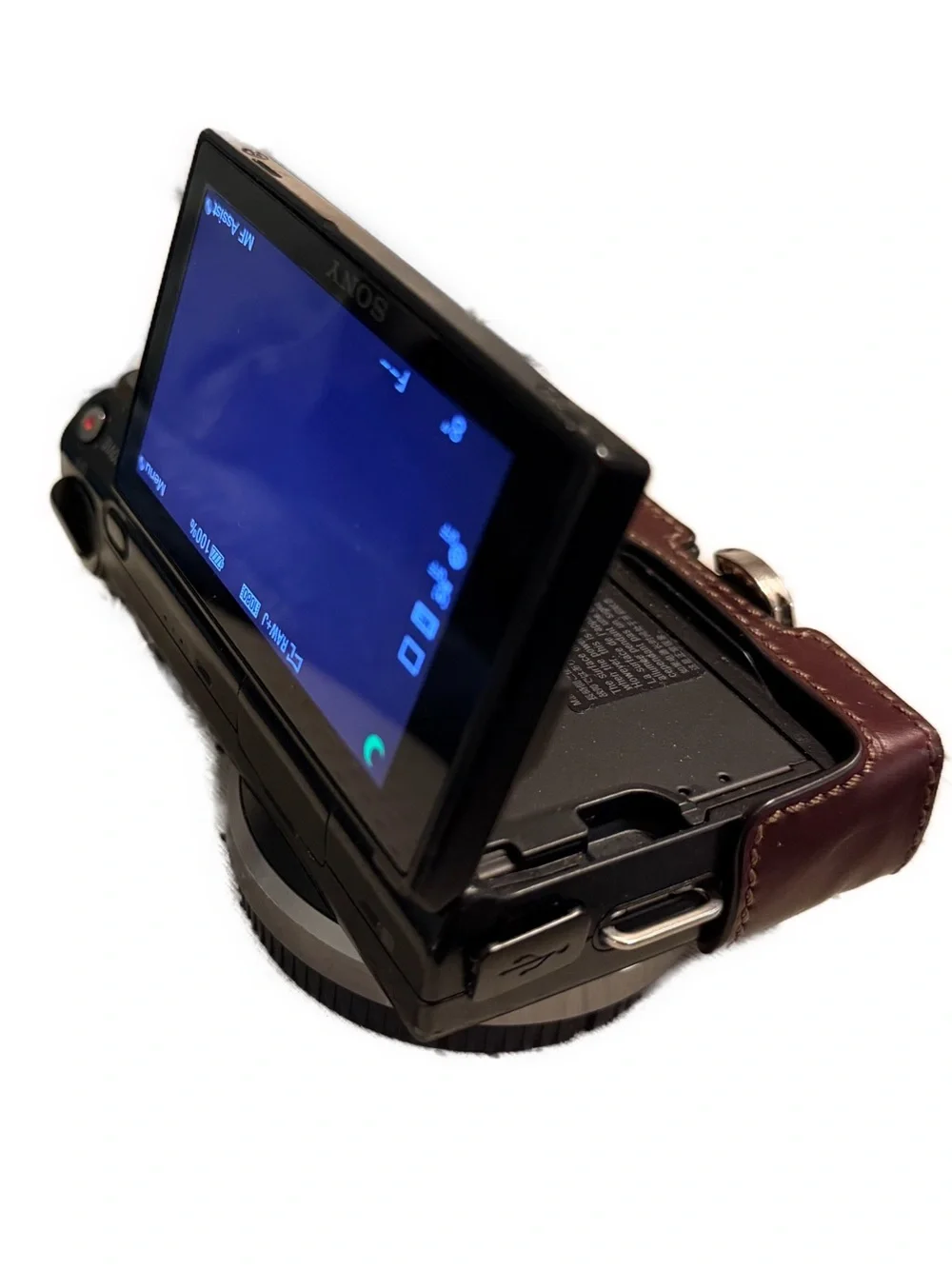 Sony Nex5 Mirrorless Camera with Gariz Brown Leather Half Case and Charger.